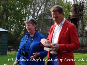 Michael enjoys a slice of Anna's cake.