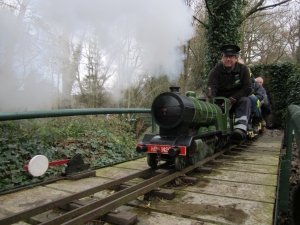 Steaming from the tunnel exit.