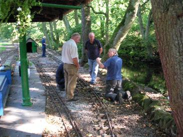 The 'Wednesday gang' carry out final checks on the newly-aligned down line.